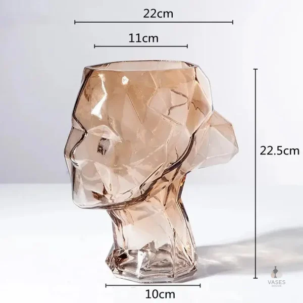Vase haut en verre avec design visage stylisé
